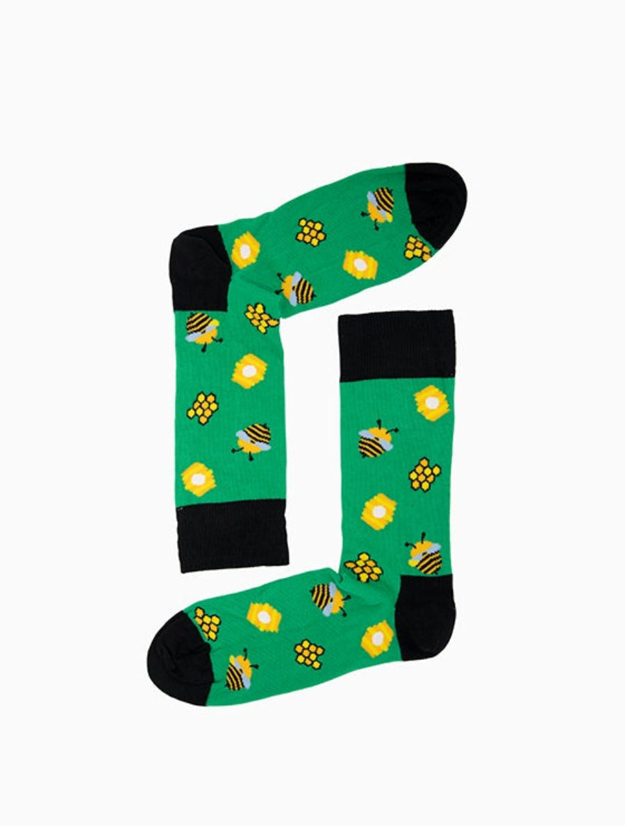Grüne Socken mit Bienen-Motiv und Honigwaben “Bee Me” von We are Socks!
